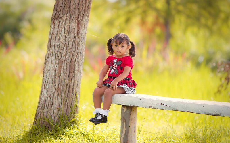 Little Girl on Bench — Green