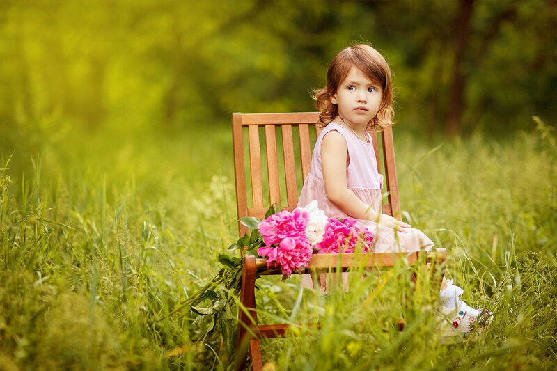 Little Girl on Chair