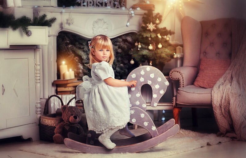 Little Girl on Rocking Horse
