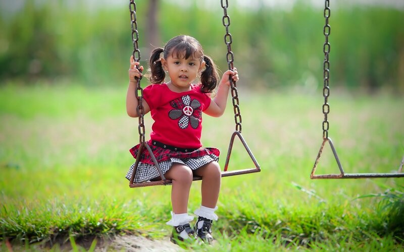 Little Girl on Swing