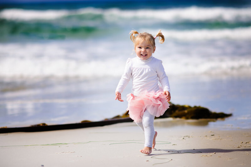 Little Girl Running on Beach