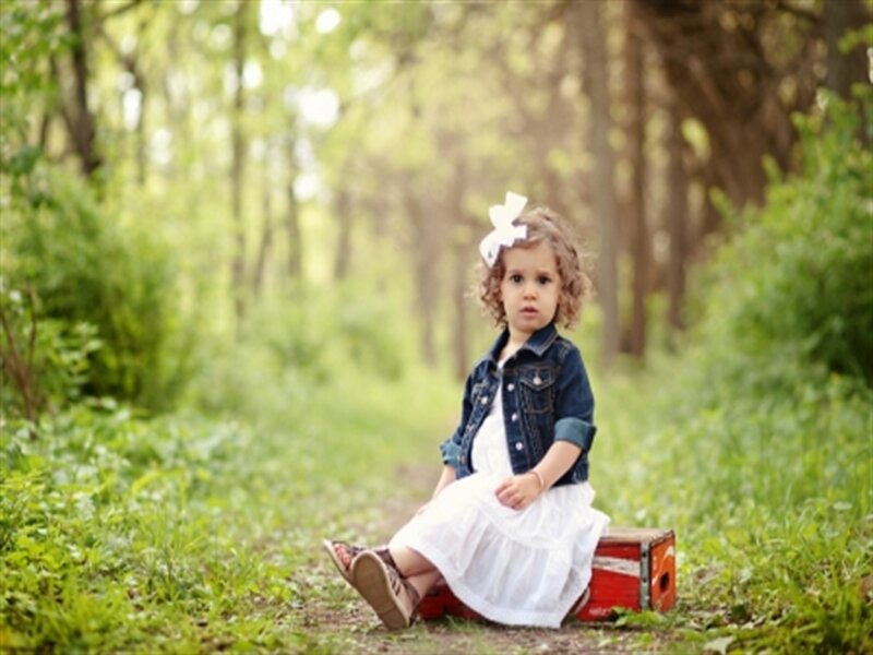 Little Girl Sitting on Box — Green