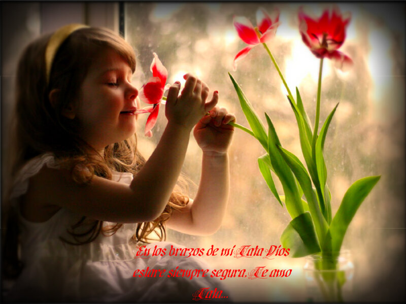 Little Girl Smelling Tulip