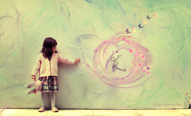 Little Girl Touching Mural