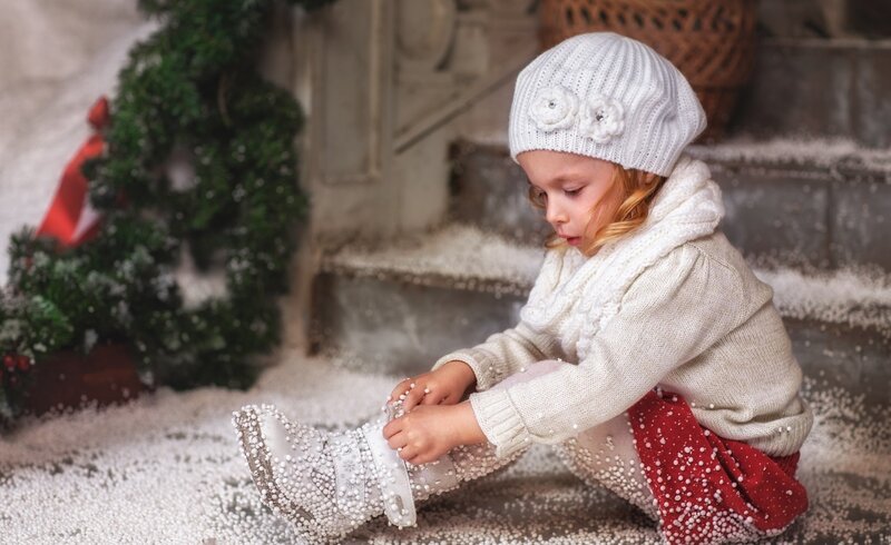 Little Girl Tying Boots