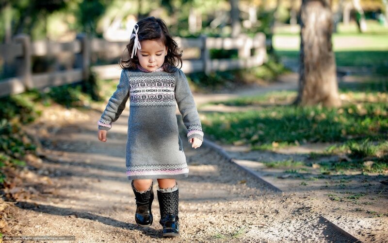 Little girl walking in park