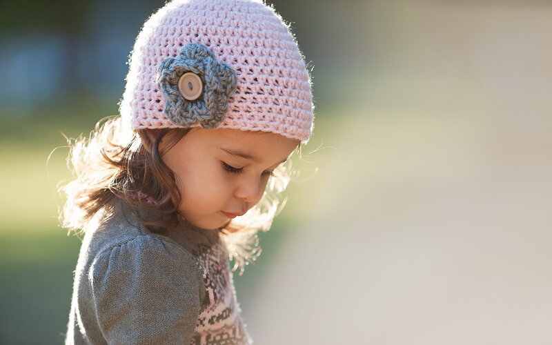 Little Girl Wearing Hat