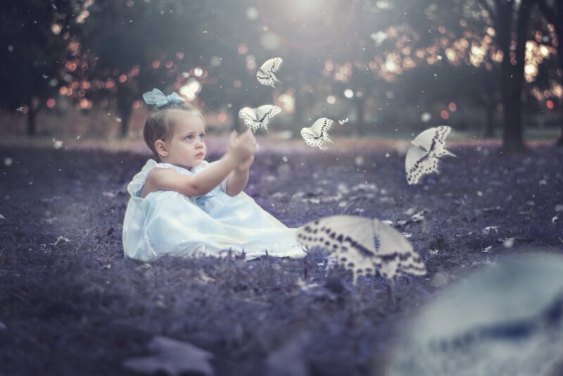 Little Girl with Butterflies