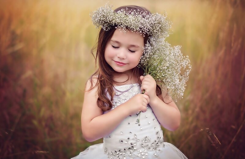 Little Girl with Flowers — White, Serene, Afternoon