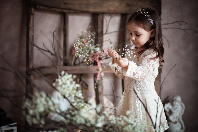 Little Girl with Flowers — White, Serene, Photograph