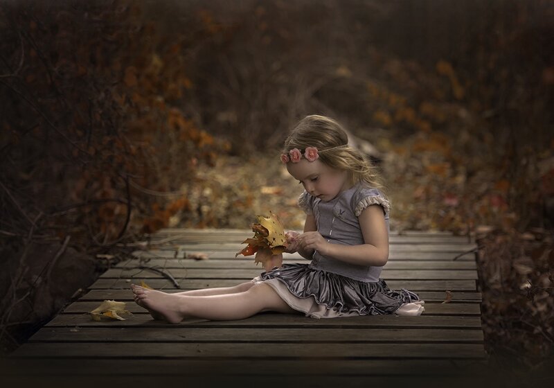 Little Girl with Leaves — Brown