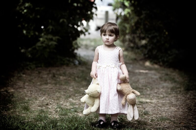 Little Girl with Stuffed Animals — White