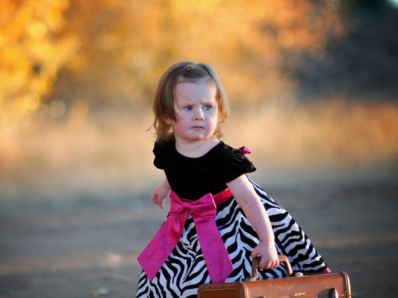 Little Girl with Suitcase
