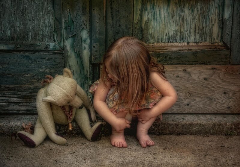 Little Girl with Teddy Bear — Brown, Somber, Photograph