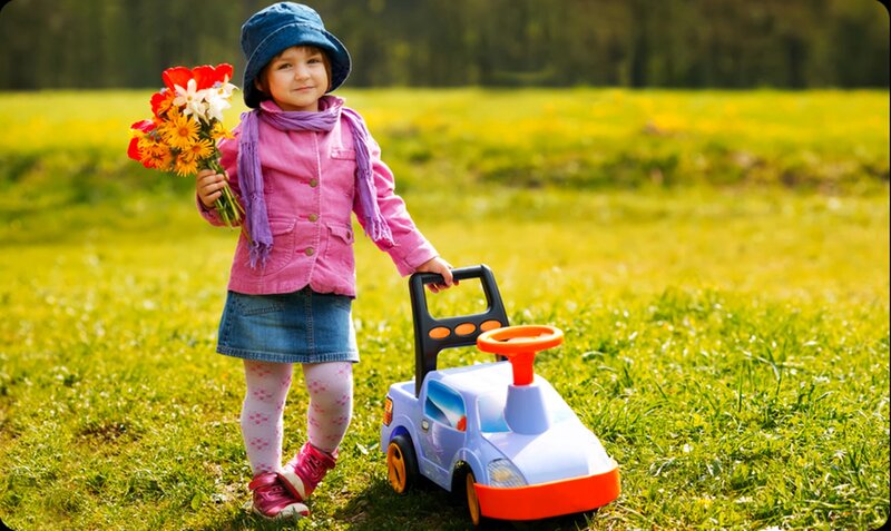 Little Girl with Toy Car