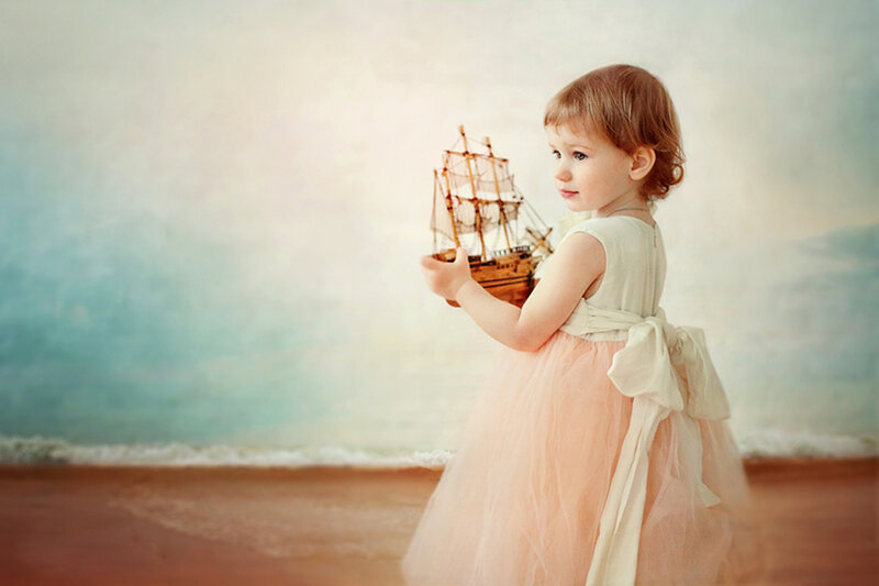 Little Girl with Toy Ship