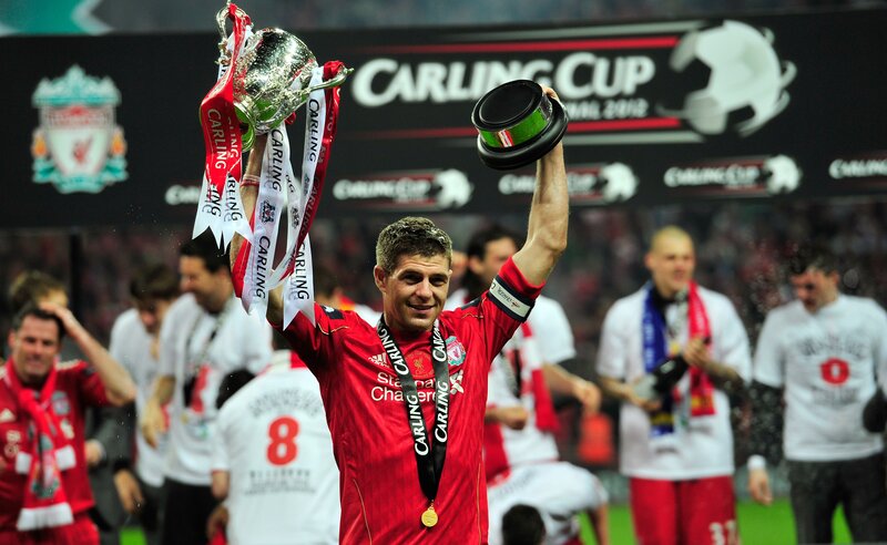 Liverpool player celebrates Carling Cup win