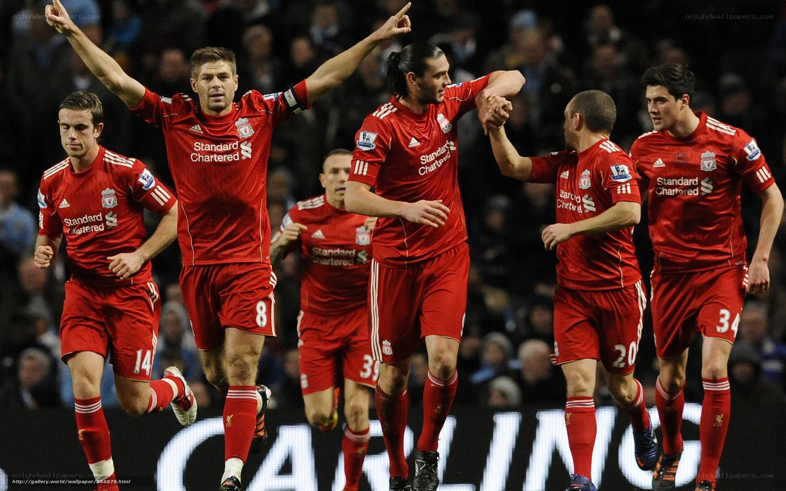 Liverpool players celebrating a goal