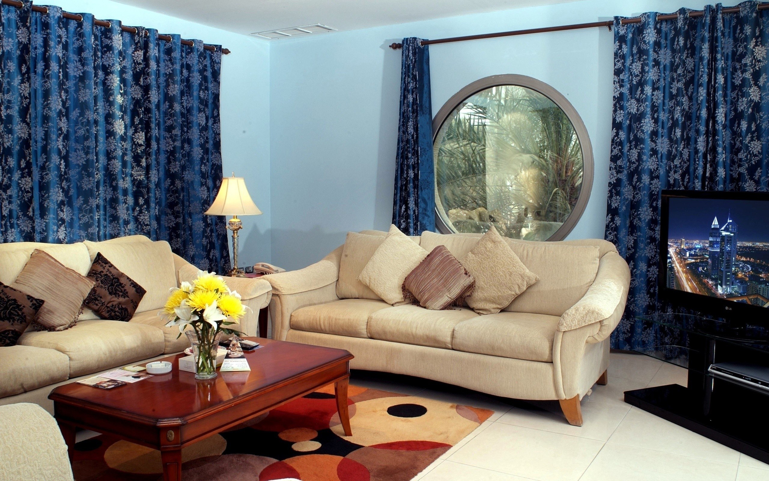 Living room with blue curtains