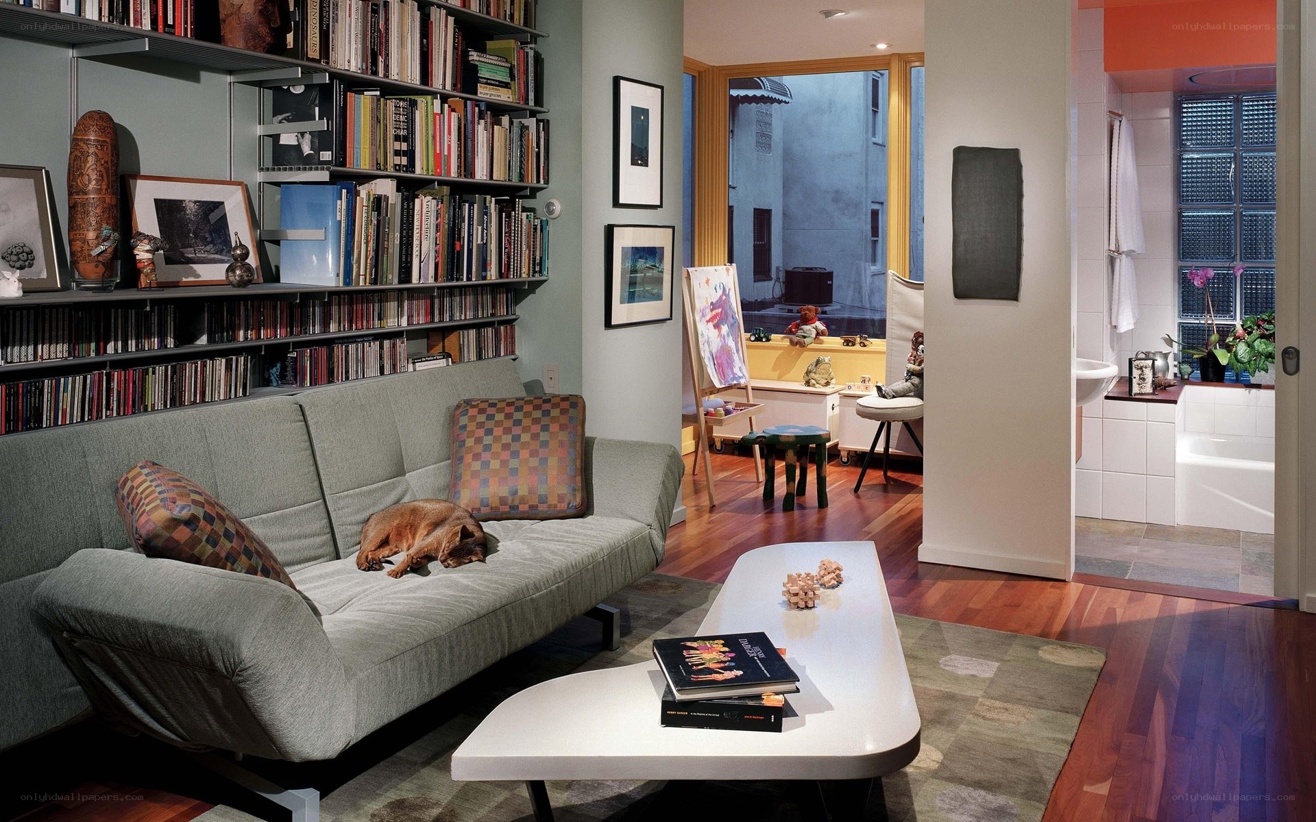 Living room with bookshelf and dog
