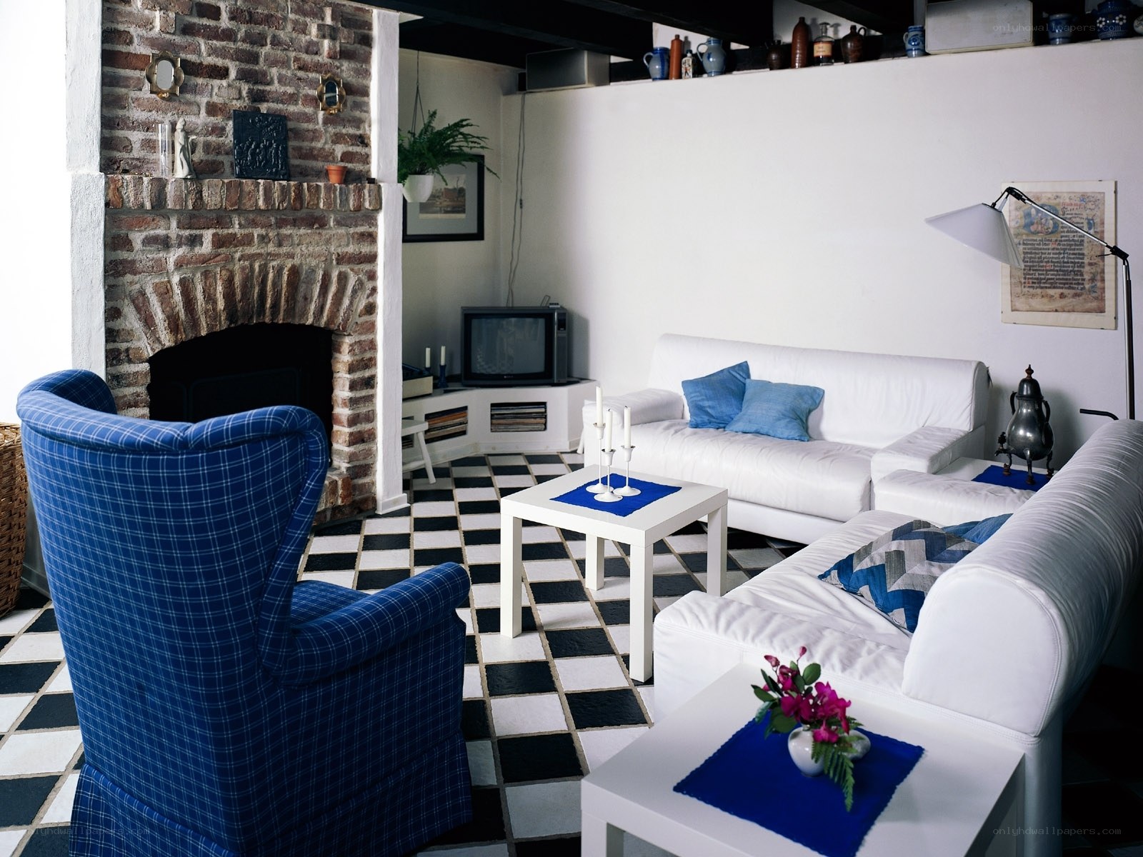 Living room with brick fireplace