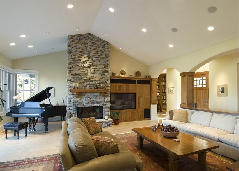 Living room with fireplace and piano