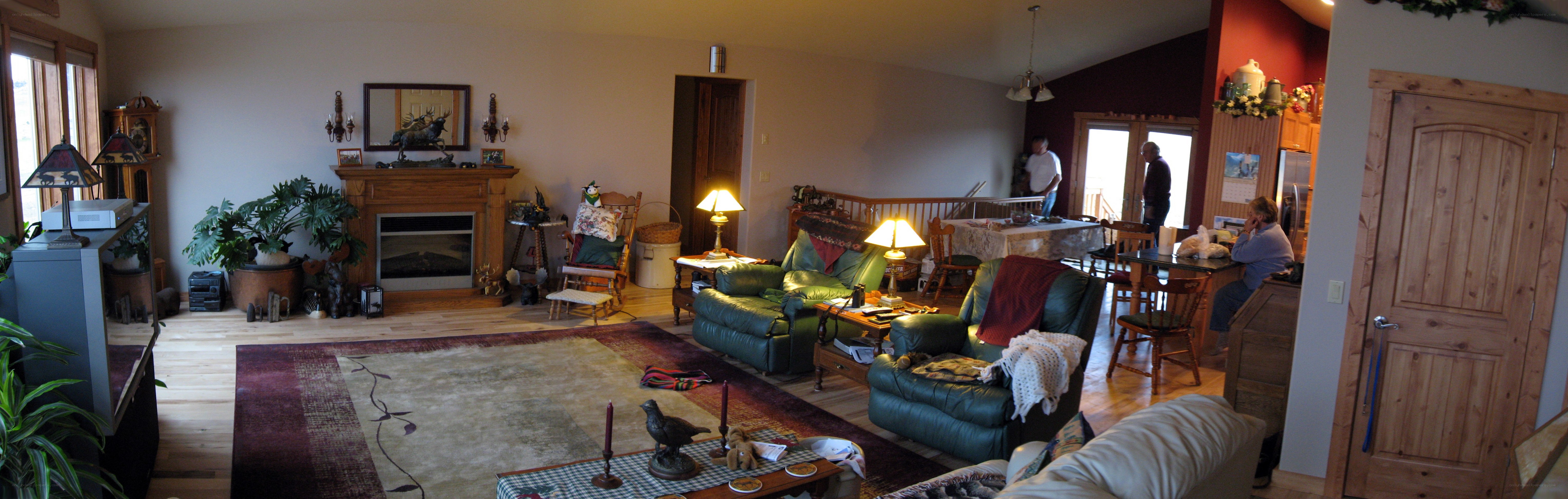 Living room with fireplace and seating
