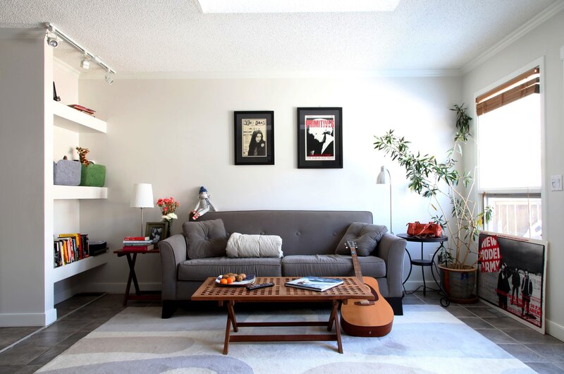 Living room with guitar and art