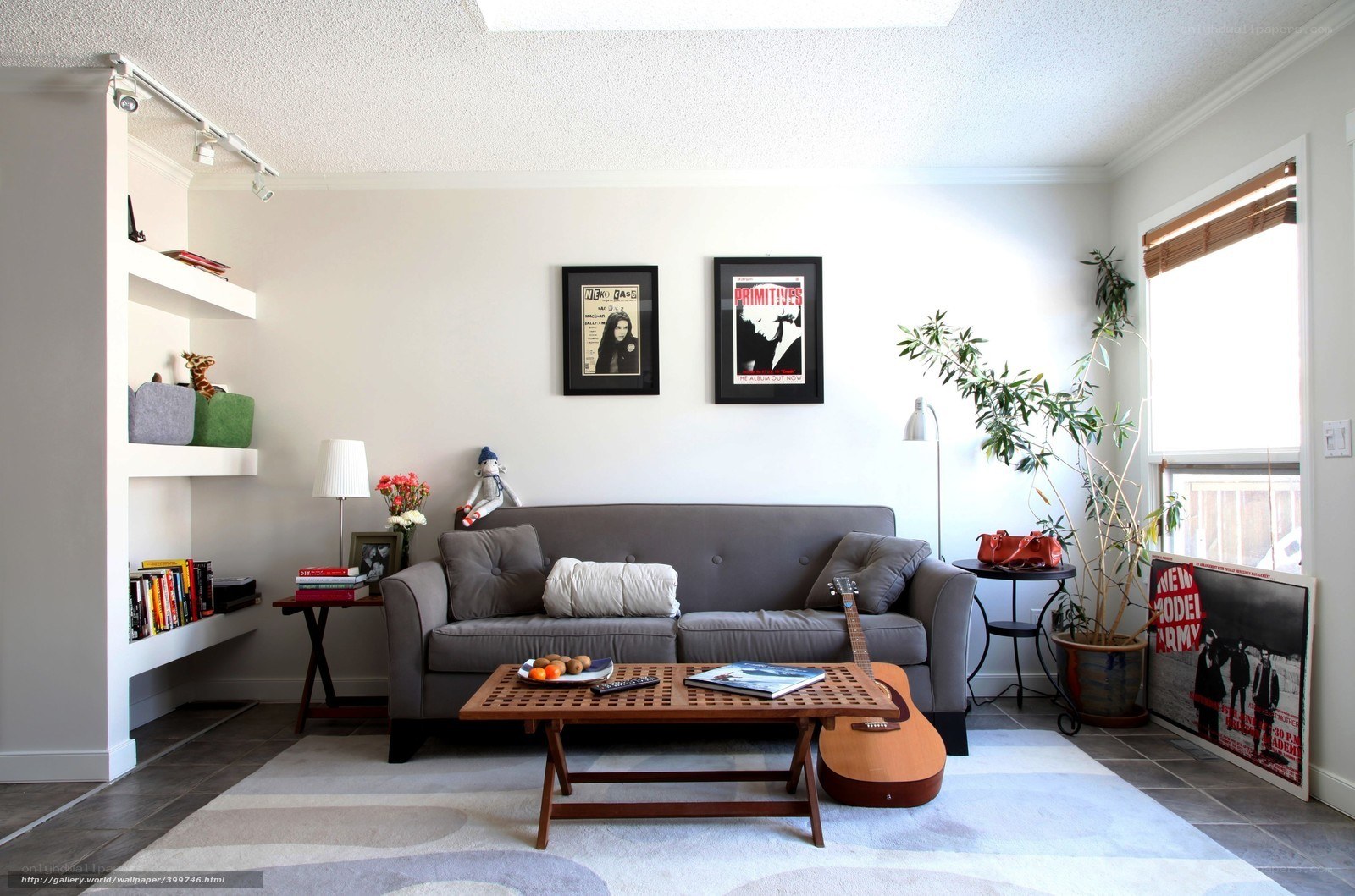 Living room with guitar and art