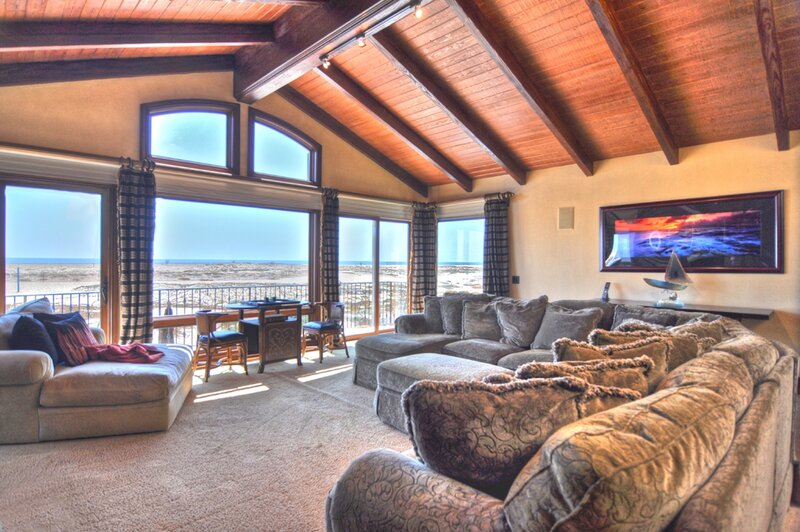 Living Room with Ocean View — Beige, Serene, Afternoon, Photograph, Sofa, Window, Artwork