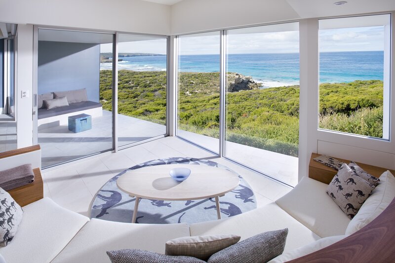 Living Room with Ocean View — White, Serene, Afternoon, Photograph, Sofa