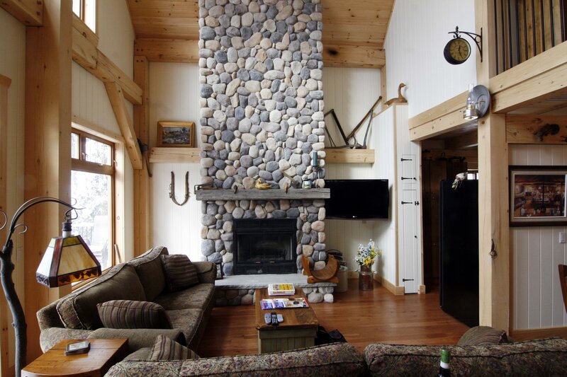Living Room with Stone Fireplace — Brown