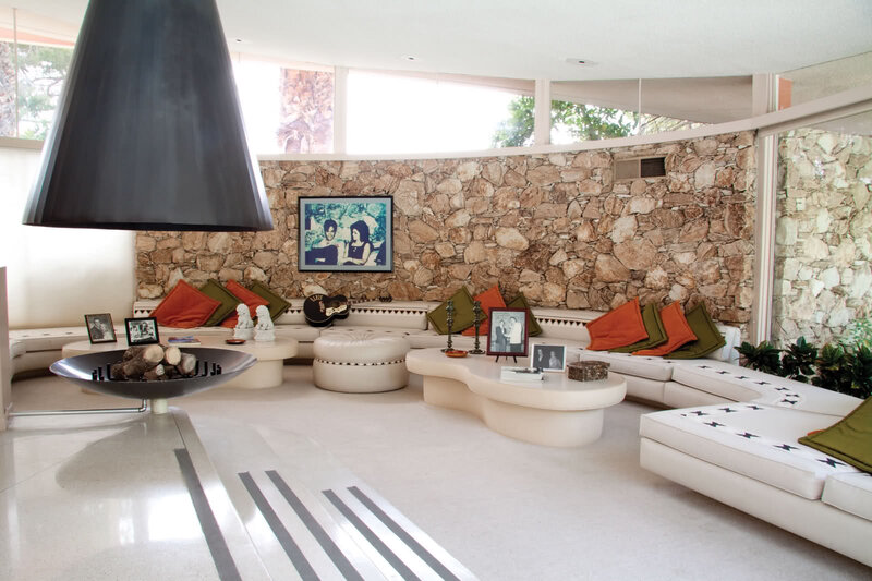 Living Room with Stone Wall