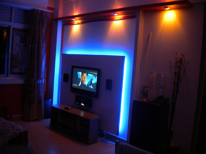 Living room with TV and blue lighting