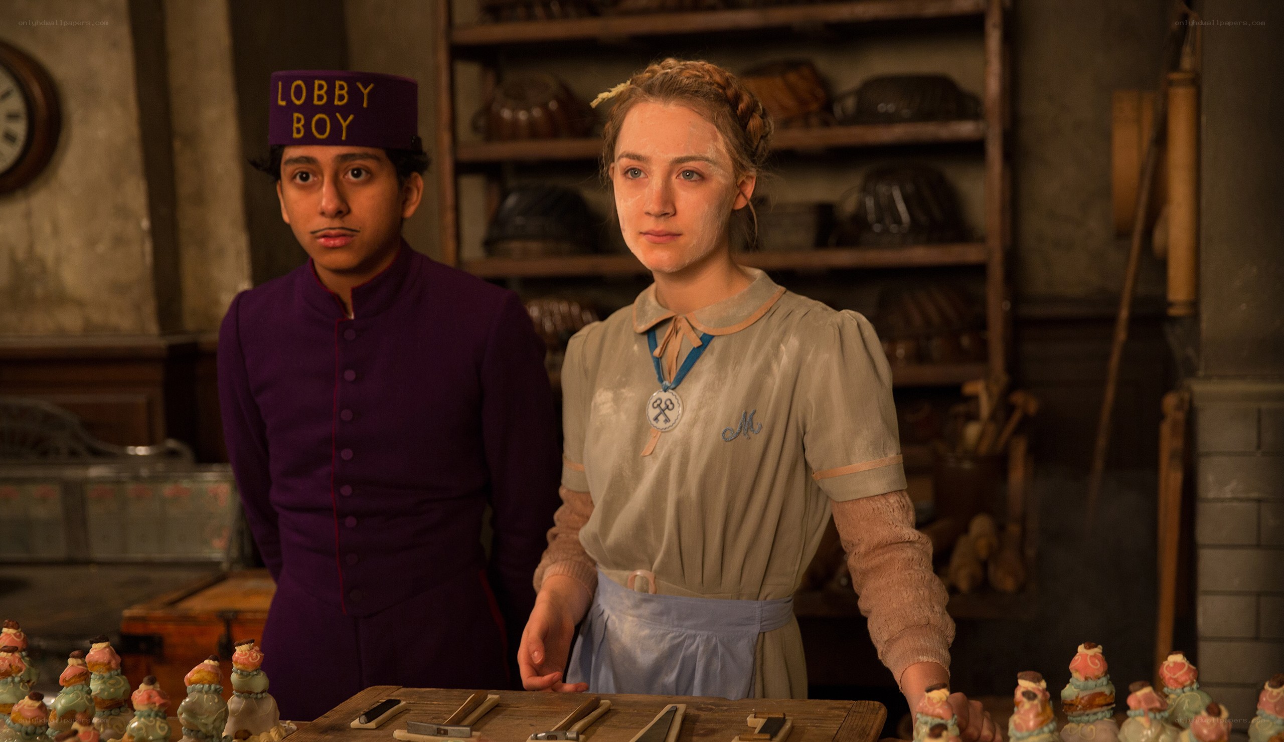 Lobby boy and maid in kitchen