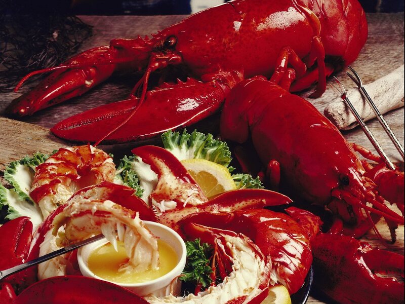 Lobster feast on wooden table