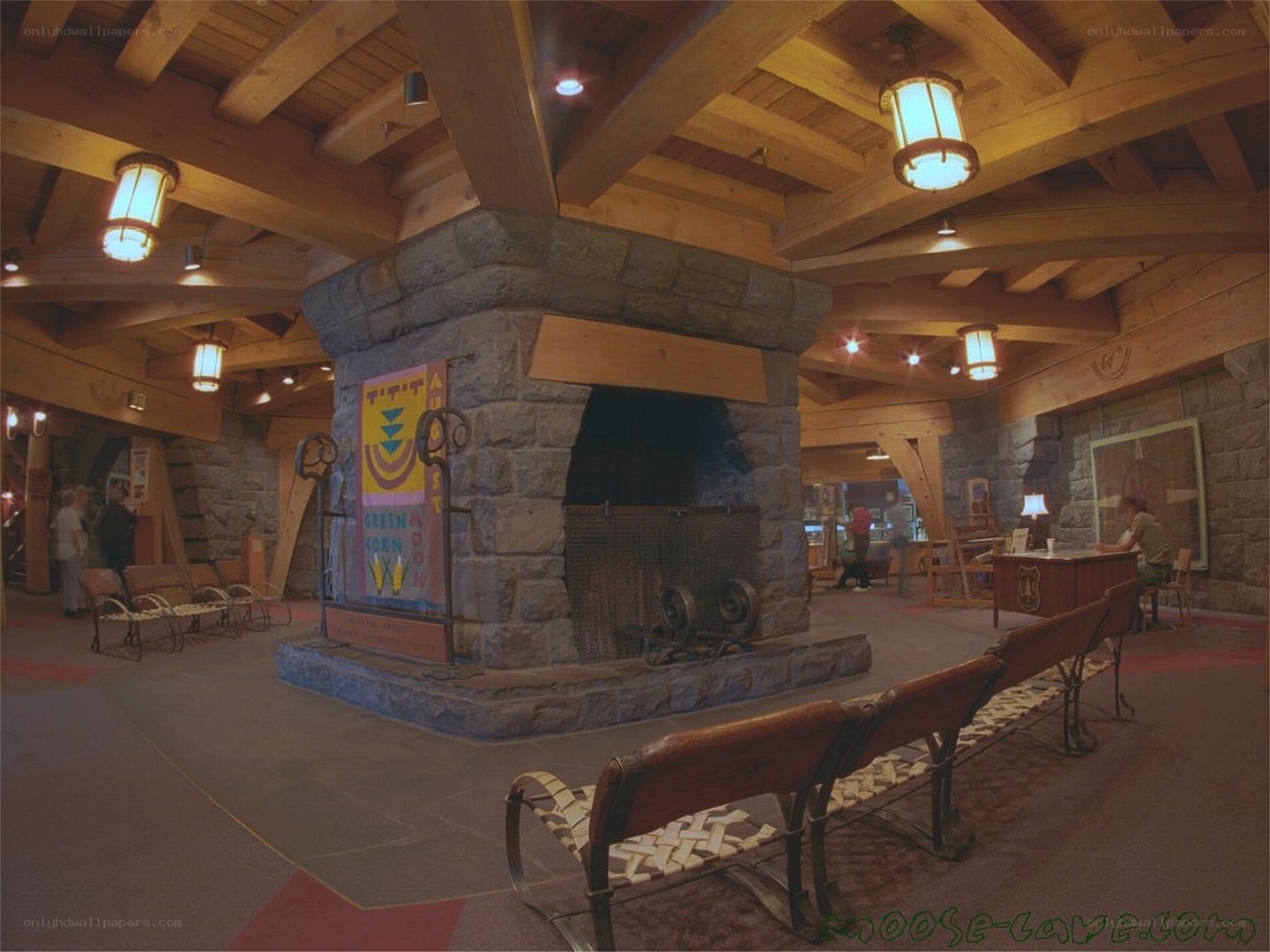 Lodge interior with stone fireplace
