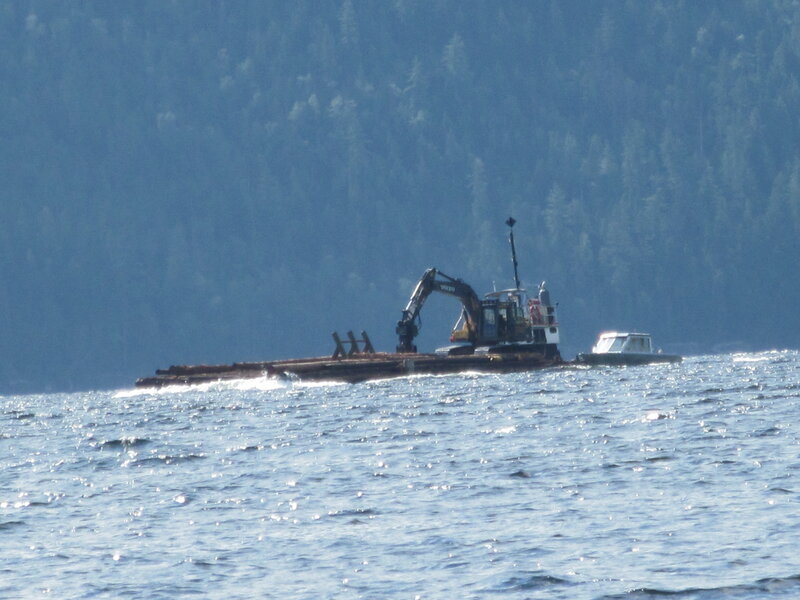 Log Barge on Lake