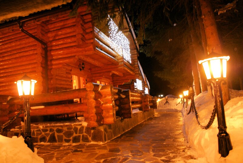 Log Cabin at Night — Orange