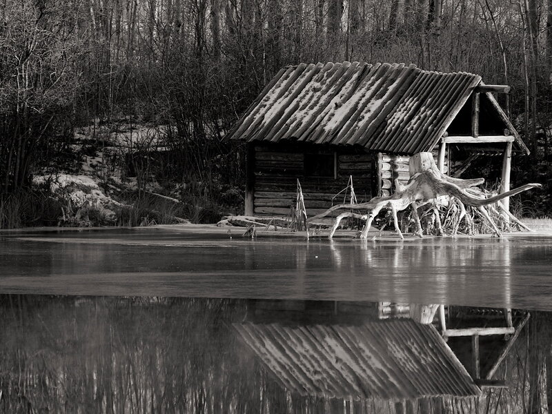 Log Cabin by Frozen Lake