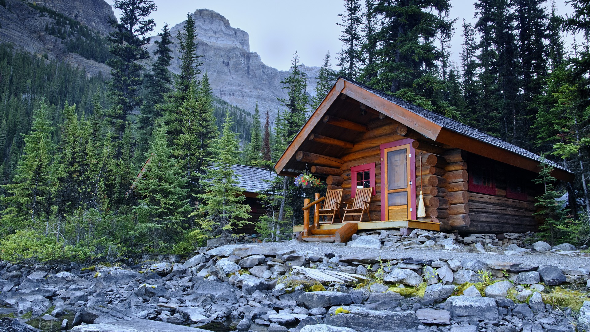 Log cabin in mountain forest