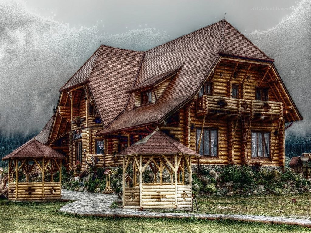 log cabin in mountain landscape