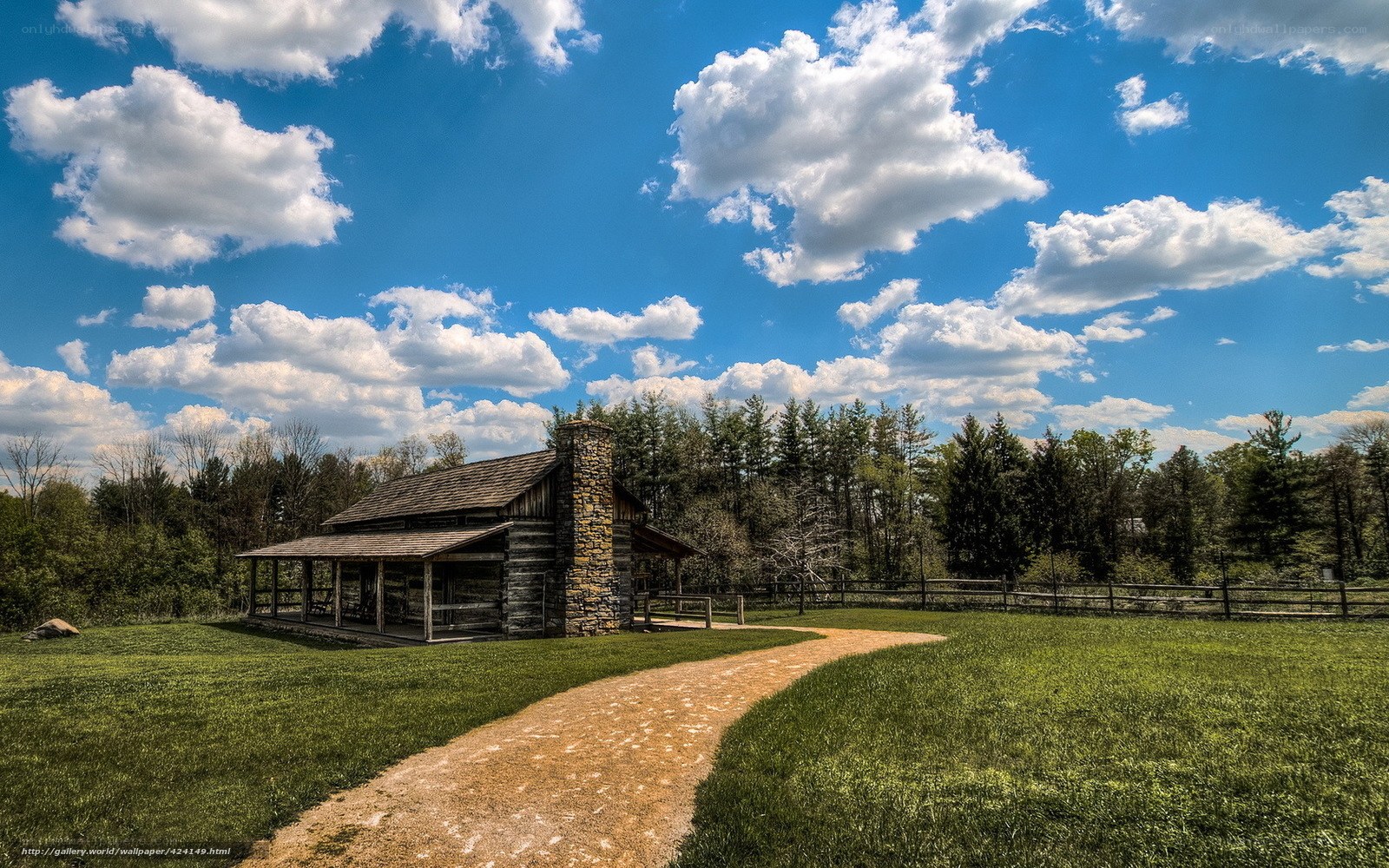 Log cabin in rural landscape