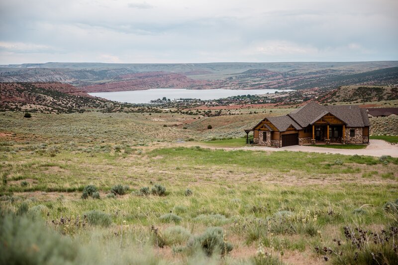 Log Cabin on Hillside — Green, Serene