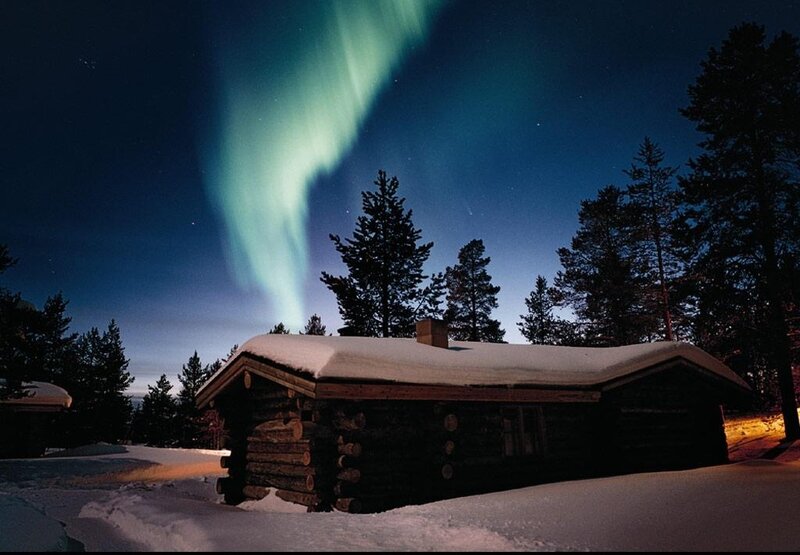 Log Cabin under Aurora