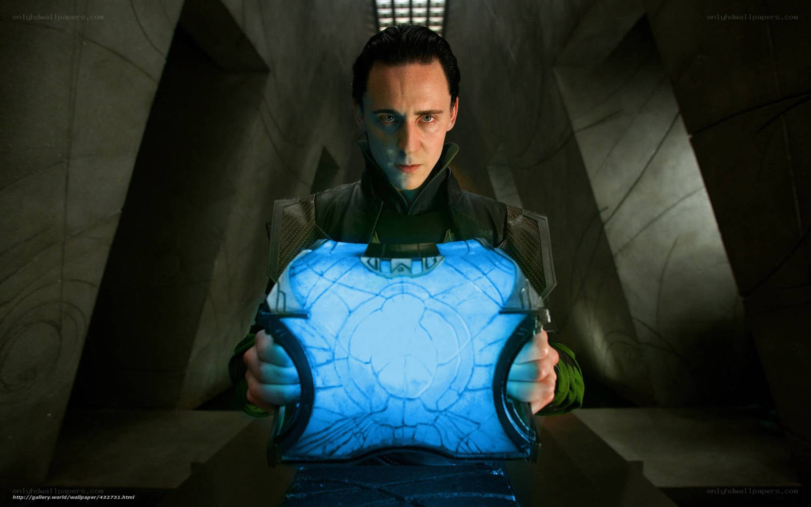 Loki holding the Tesseract