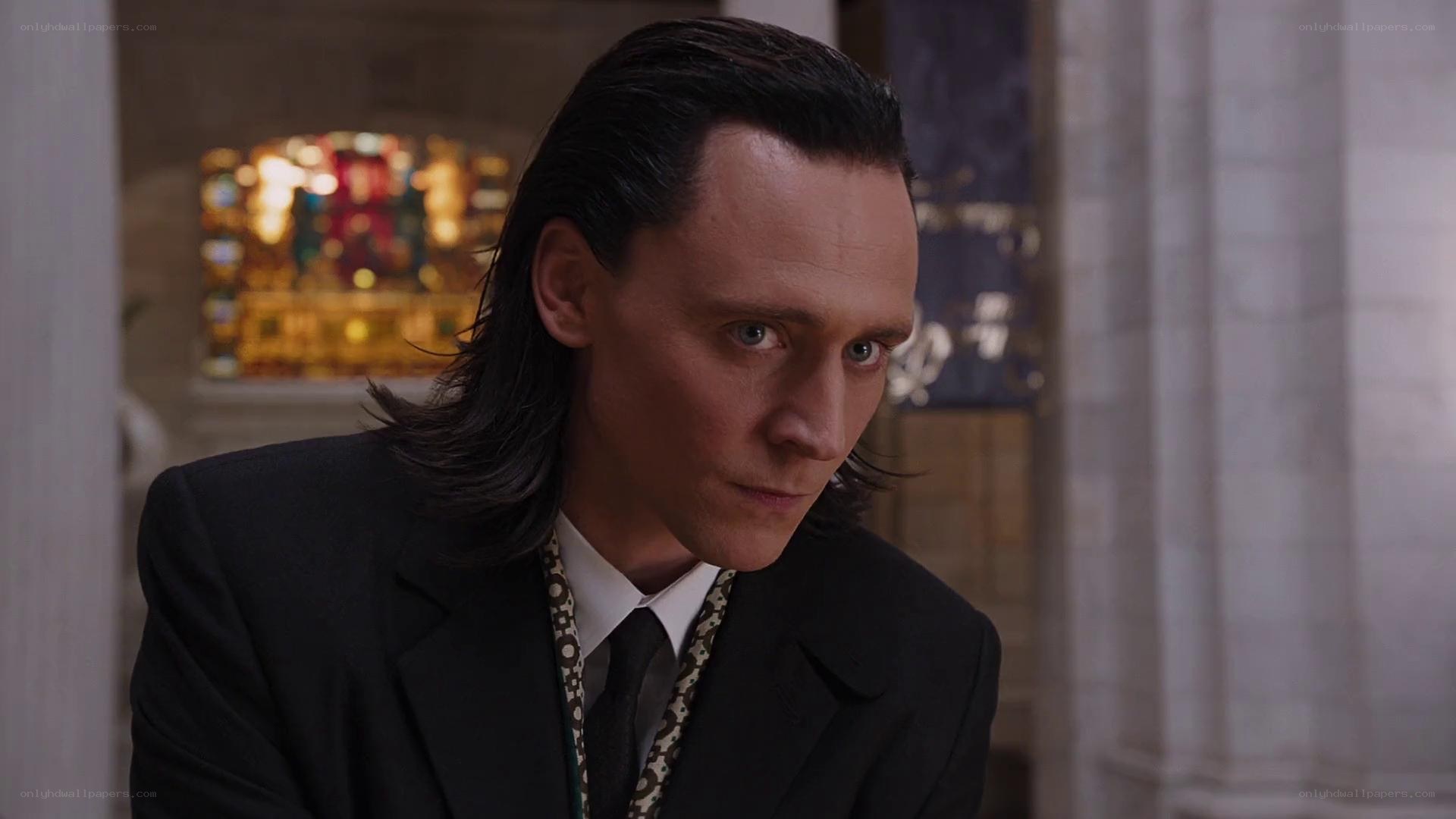 Loki in a formal suit