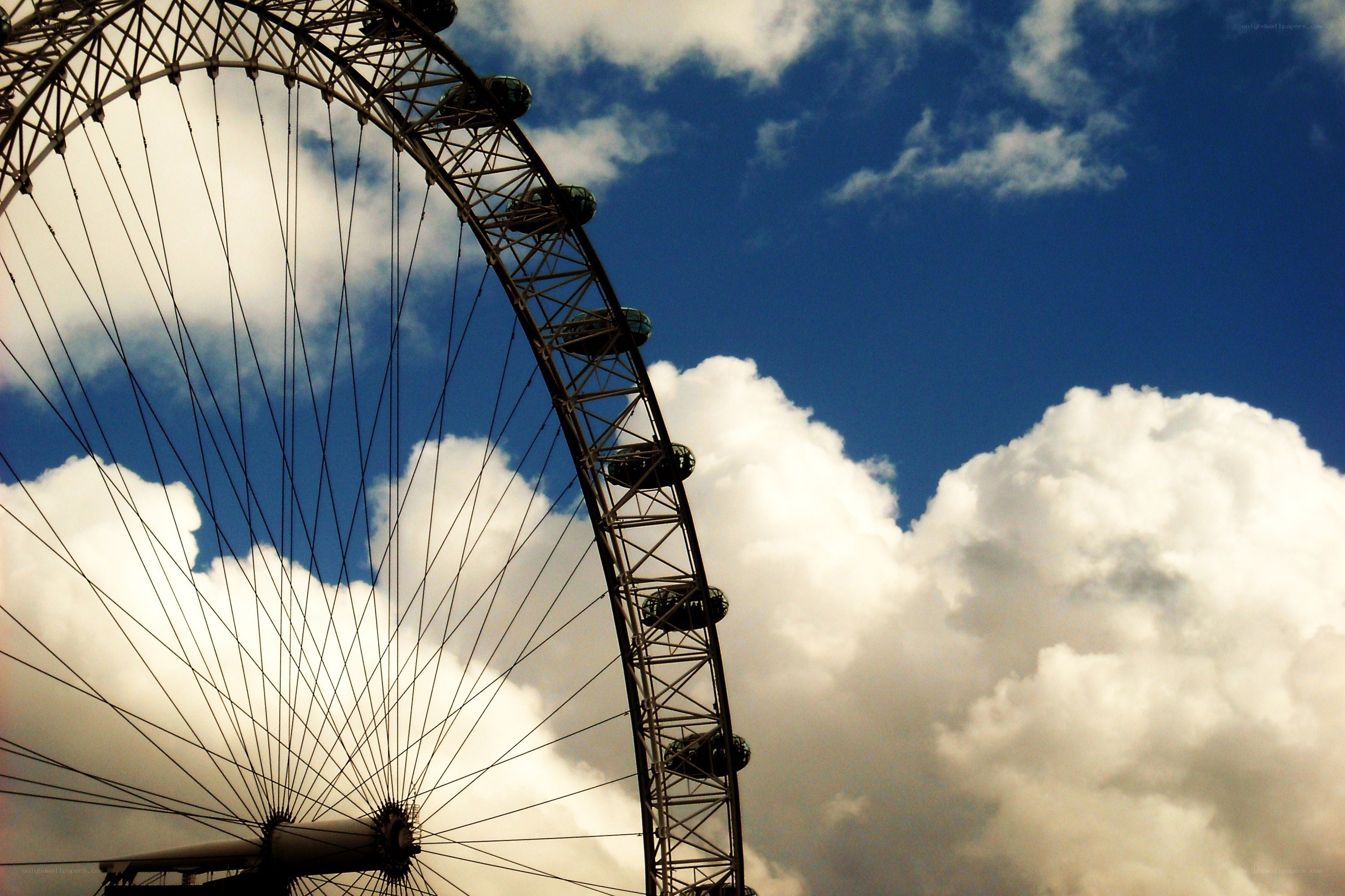 London Eye against cloudy sky