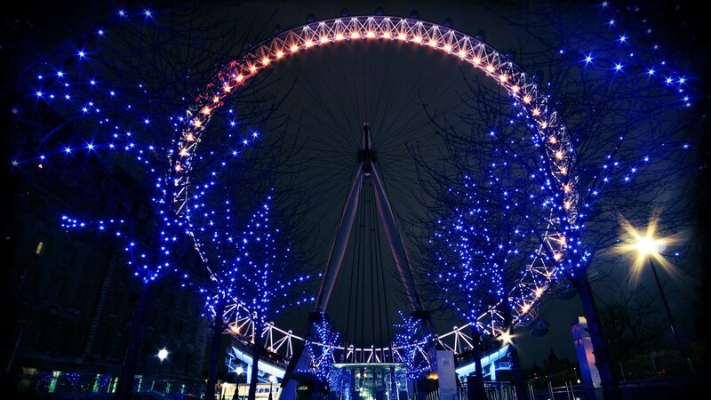 London Eye at night with lights