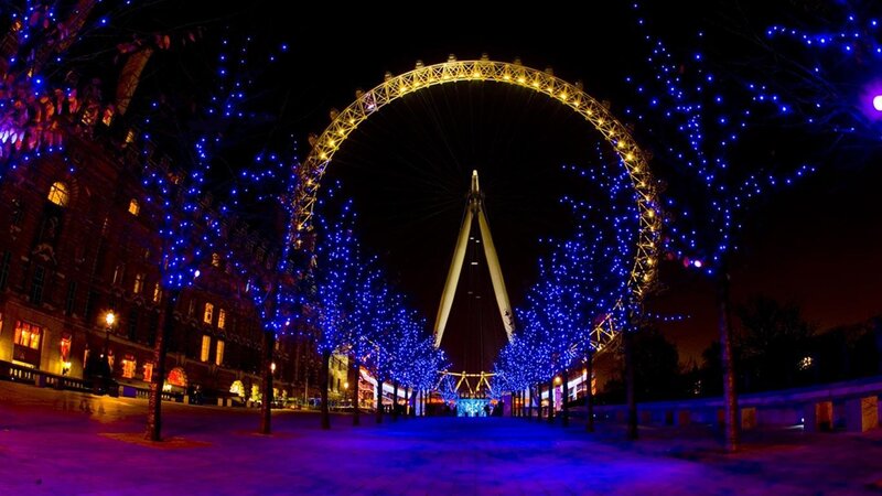 London Eye at night with lights